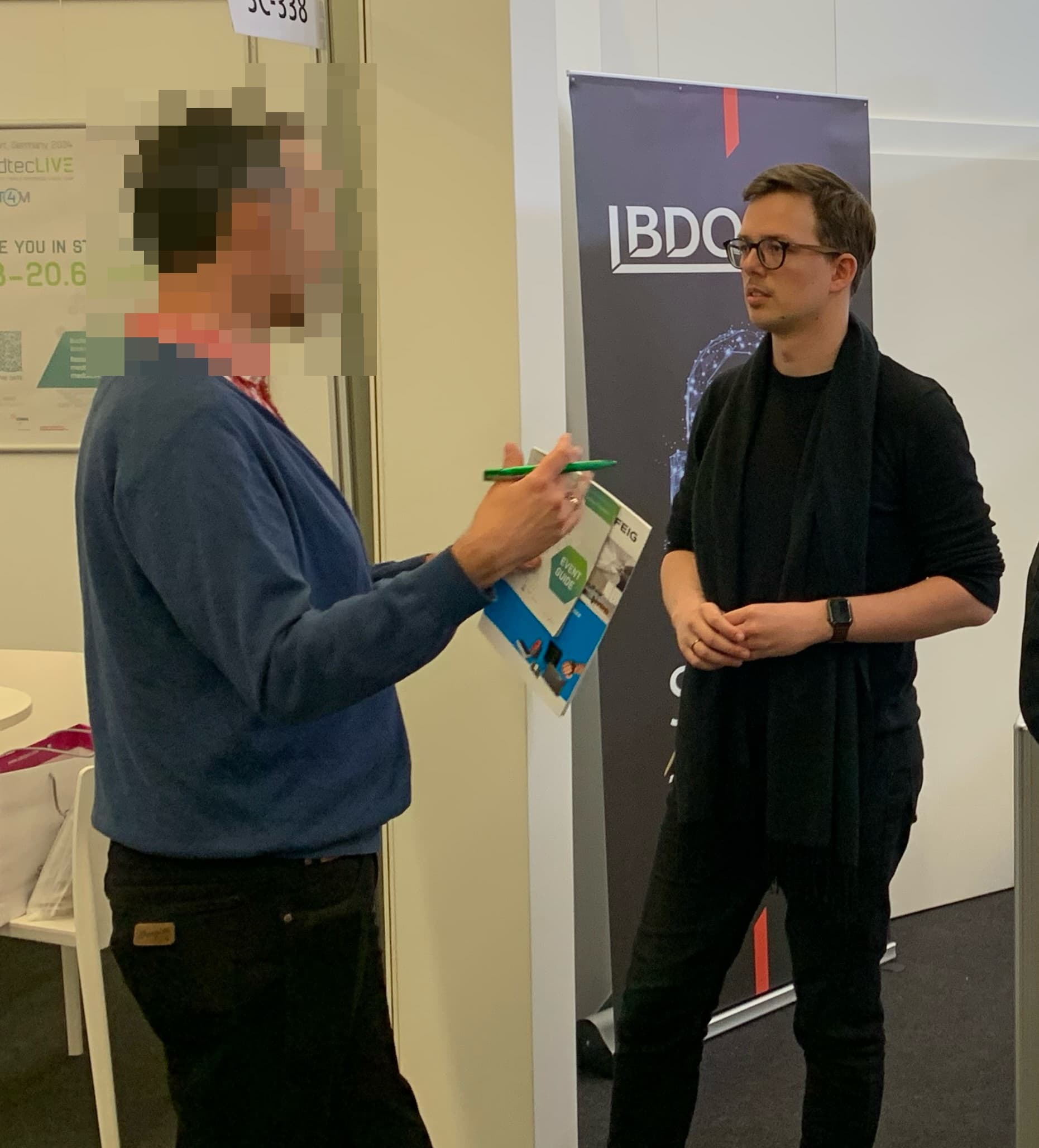 Dmitry Dugarev at the exhibition in Nuremberg representing BDO